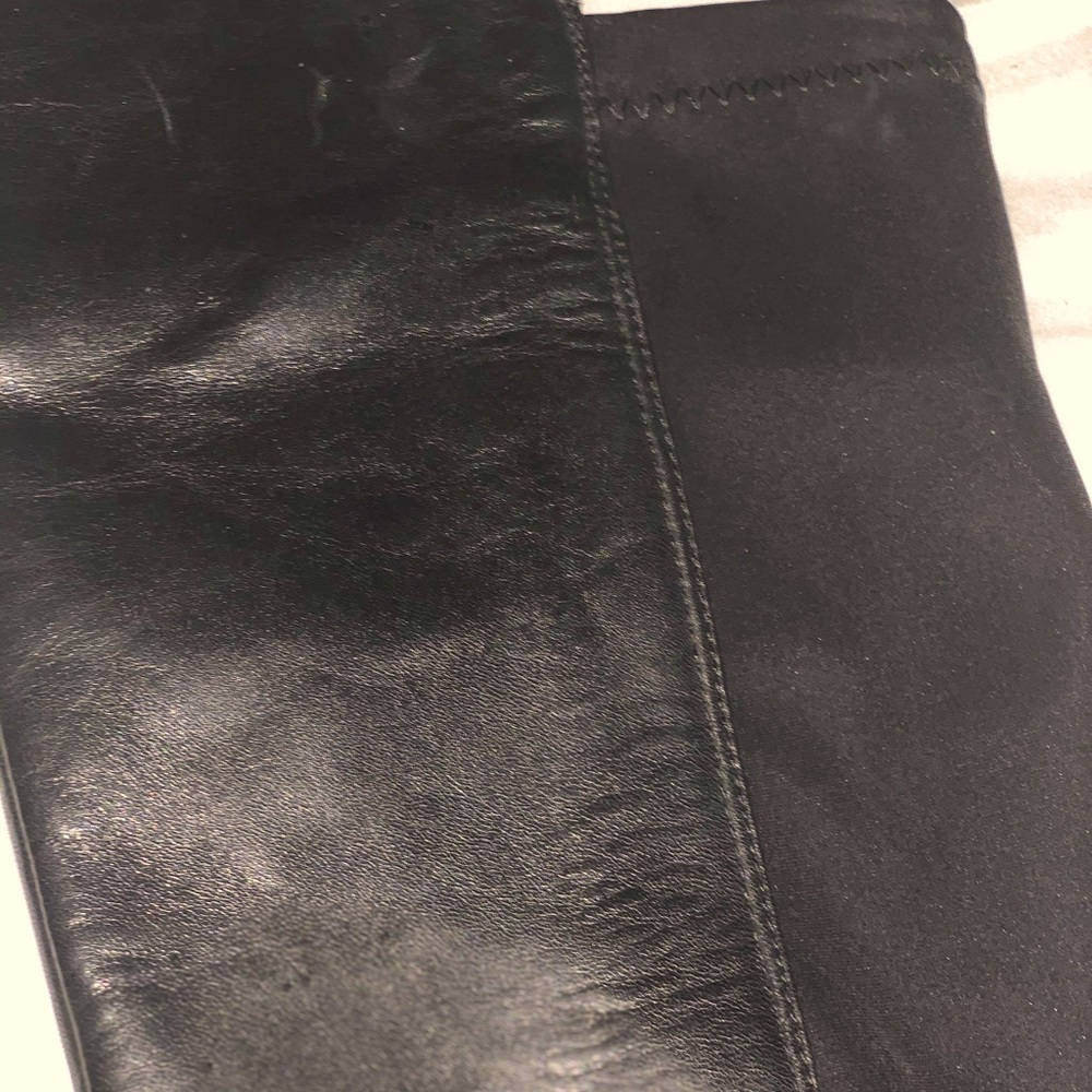 Flats over knee leather boots
